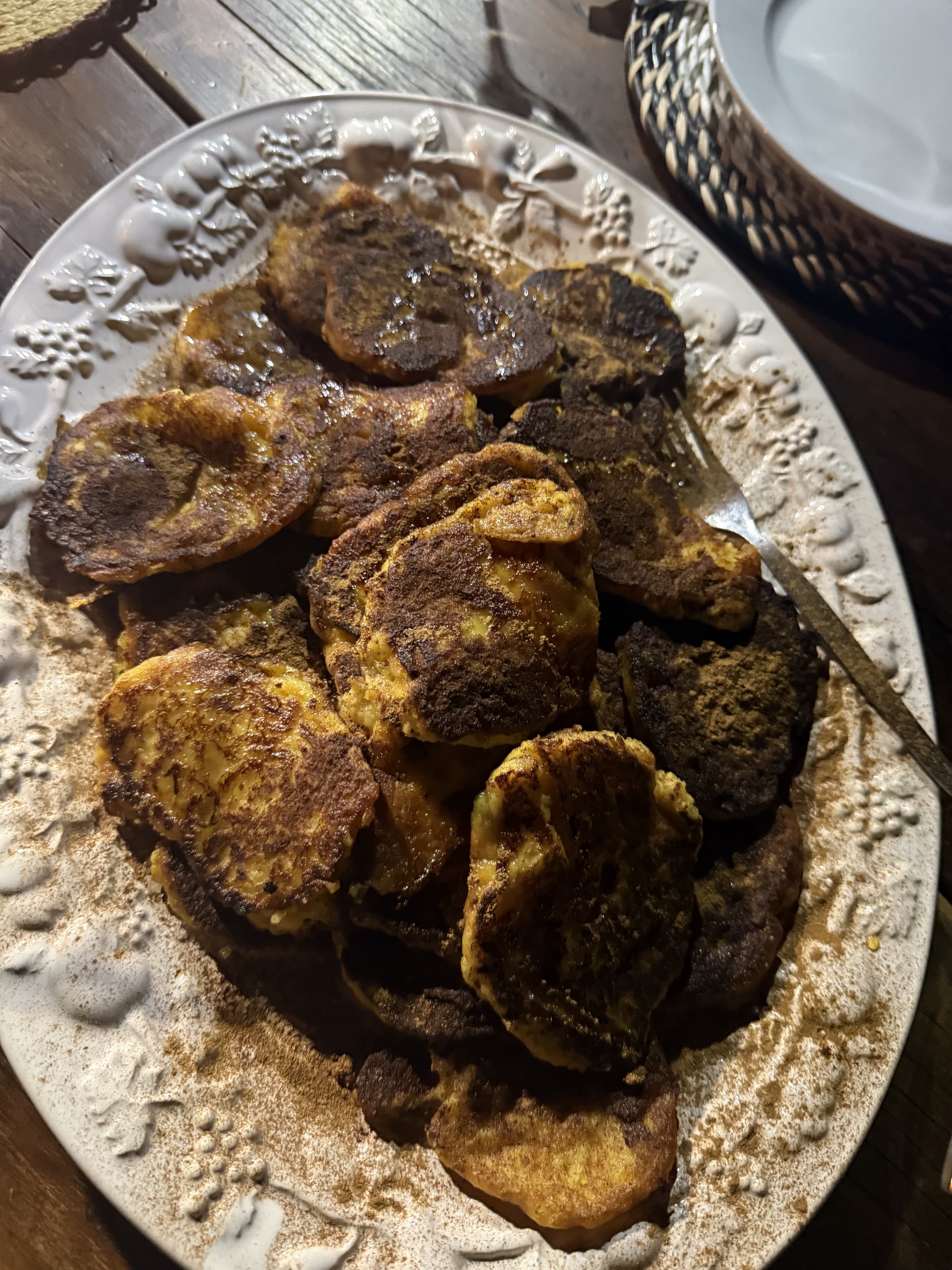 A plate of golden fried fritters served as part of a bush dinner at Samonyana Private Island.