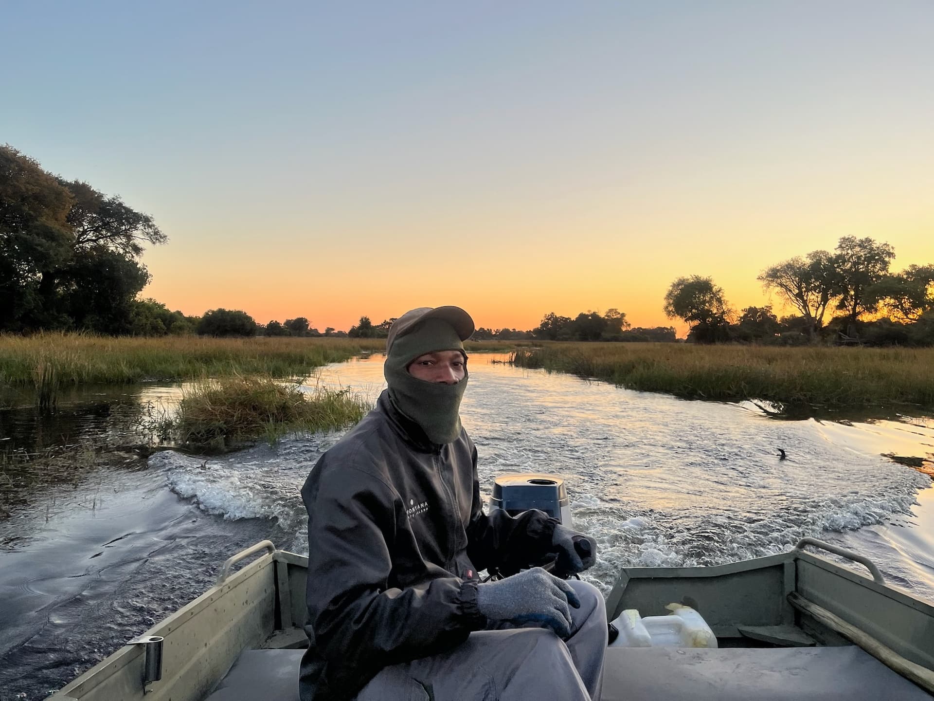 Exploring the Okavango Delta channels by motorboat from Samonyana