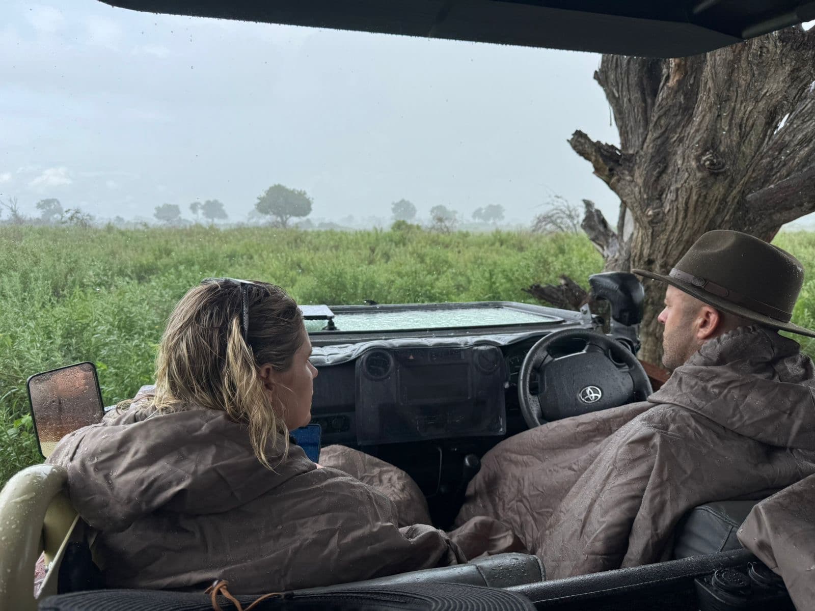 Dramatic storm clouds rolling across the Okavango Delta floodplain during a game drive