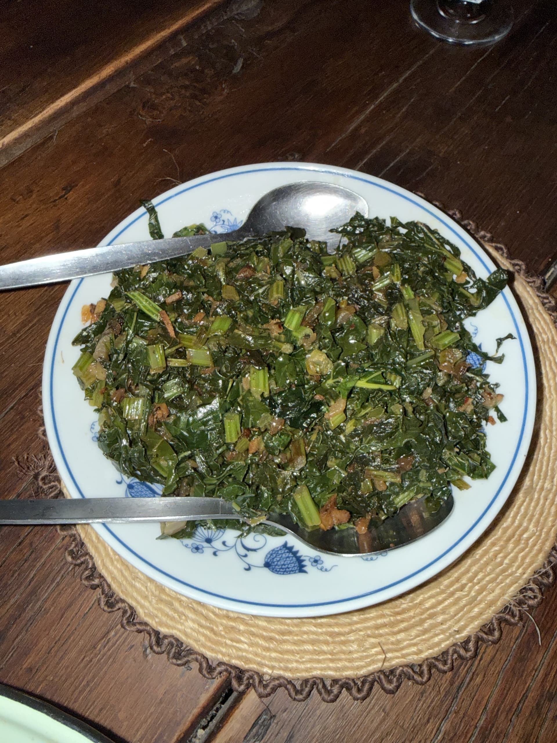 A plate of sauteed leafy greens served as a side dish at dinner at Samonyana Private Island.