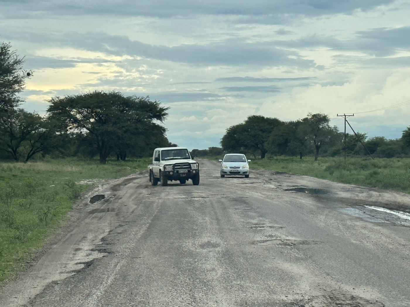 4x4 Land Cruiser on the dirt road to Samonyana Private Island in the Okavango Delta
